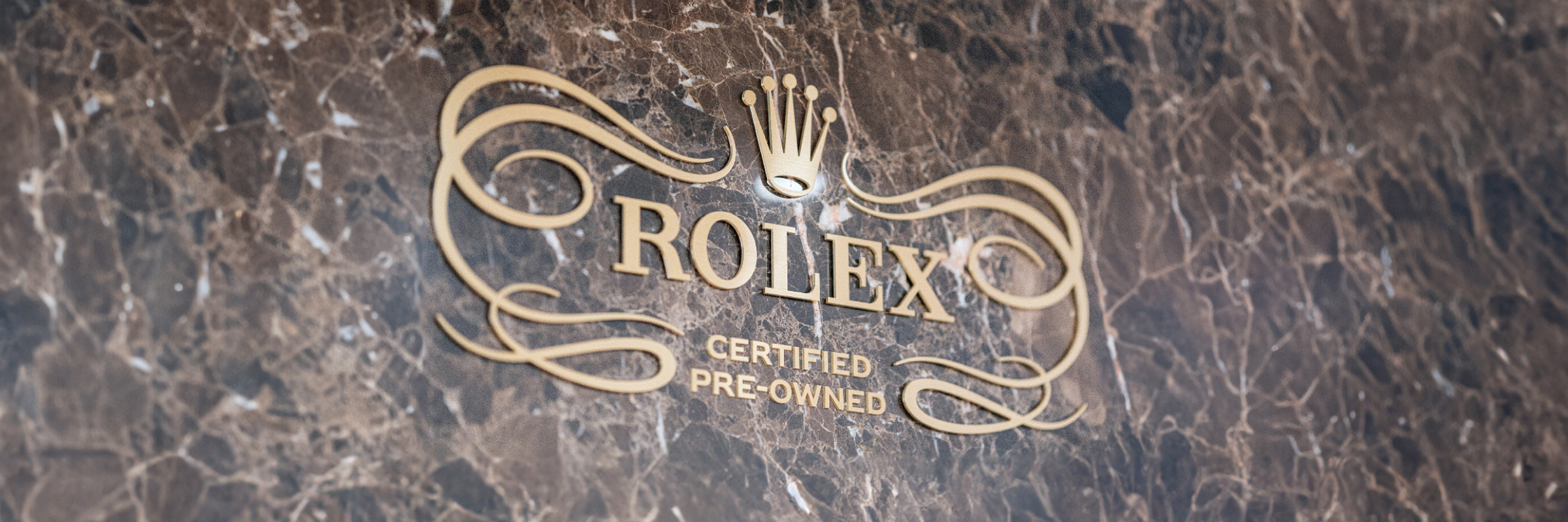 Rolex Certified Pre-Owned skylt